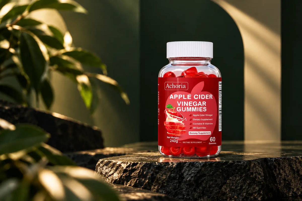 Achoria Apple Cider Vinegar Gummies bottle on a dark green luxury background